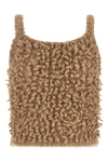 peserico cropped top redefines contemporary knitwear through tactile volumes and