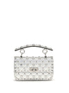 rockstud handbag in laminated leather