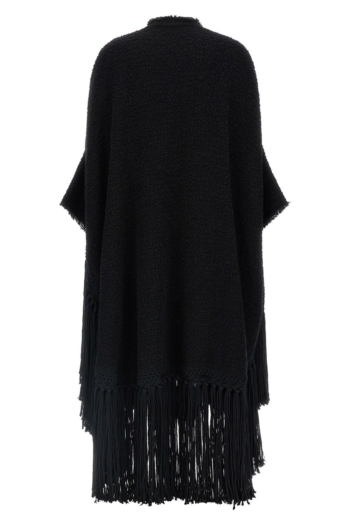 the dolce & gabbana bouclé cape stands out for its large volume