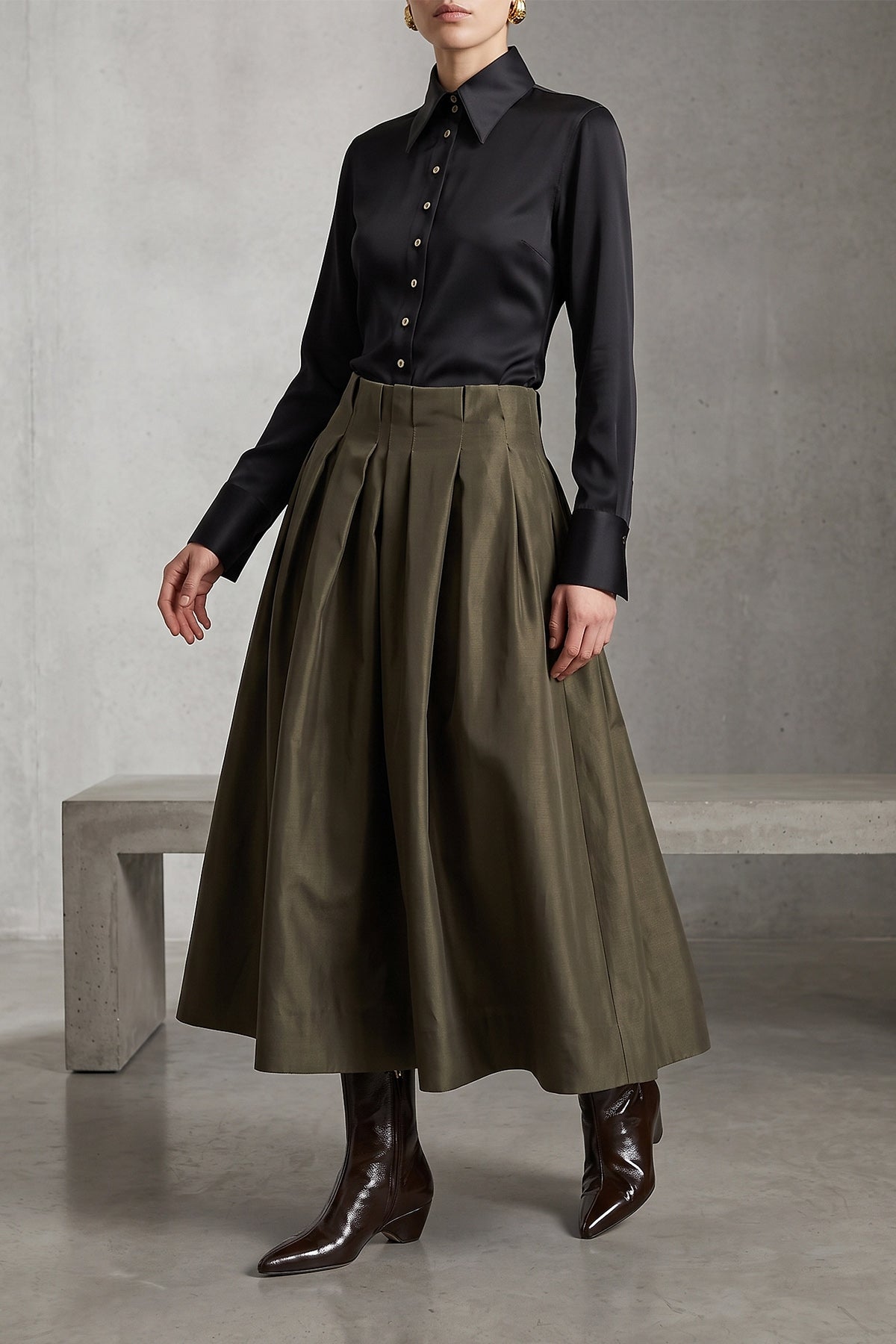 khaite sybil ankle boots redefine the classic silhouette through architectural
