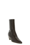 khaite sybil ankle boots redefine the classic silhouette through architectural