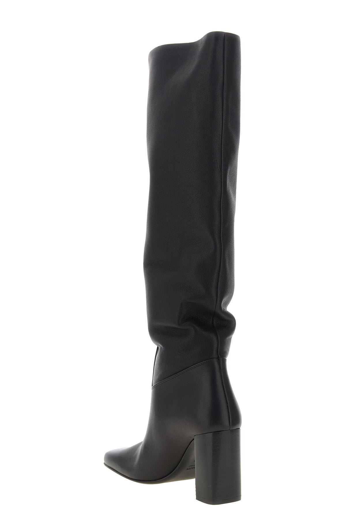 the khaite petra boot redefines vertical elegance through a rigorous silhouett