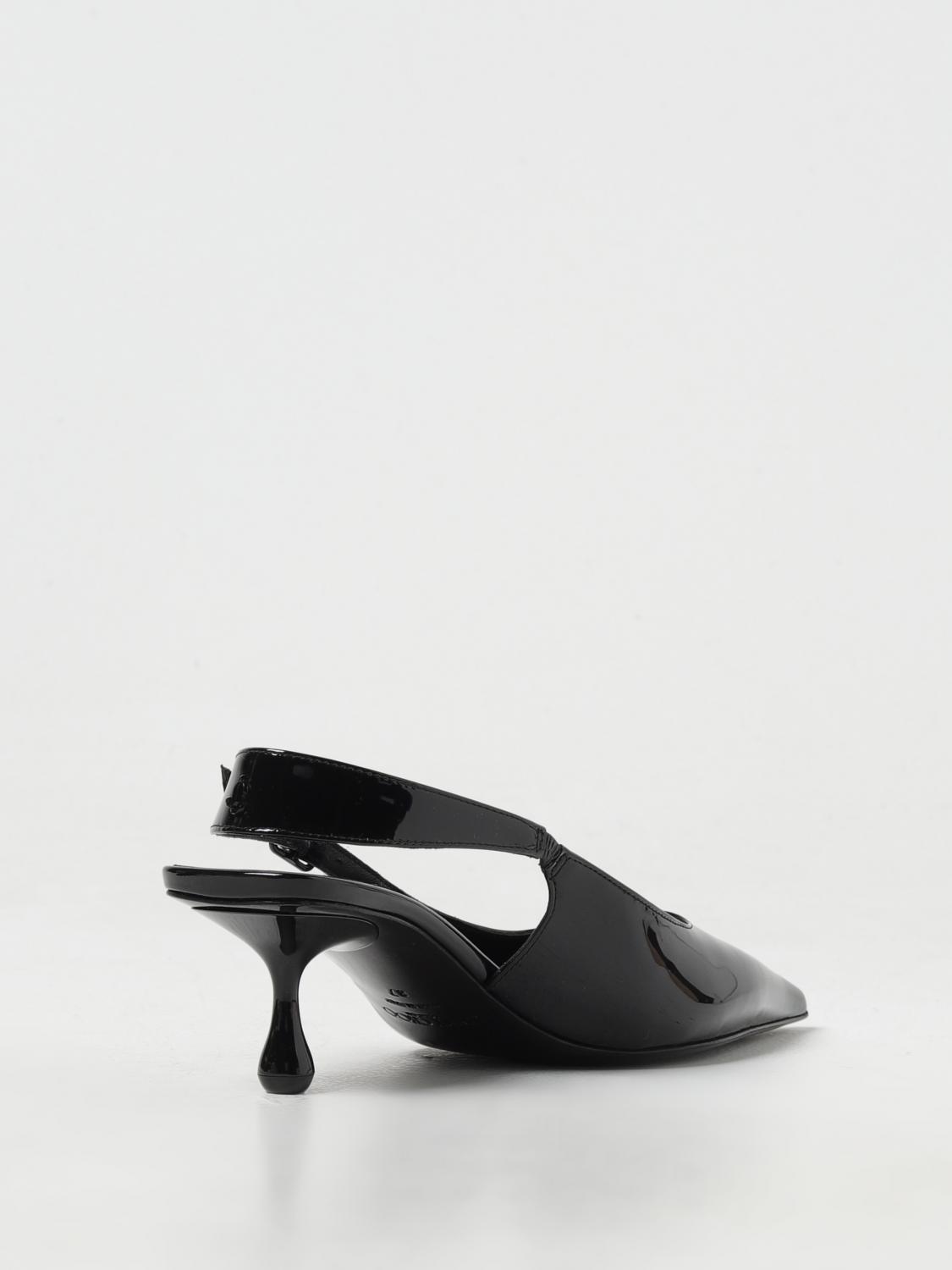 woman's high heel shoes