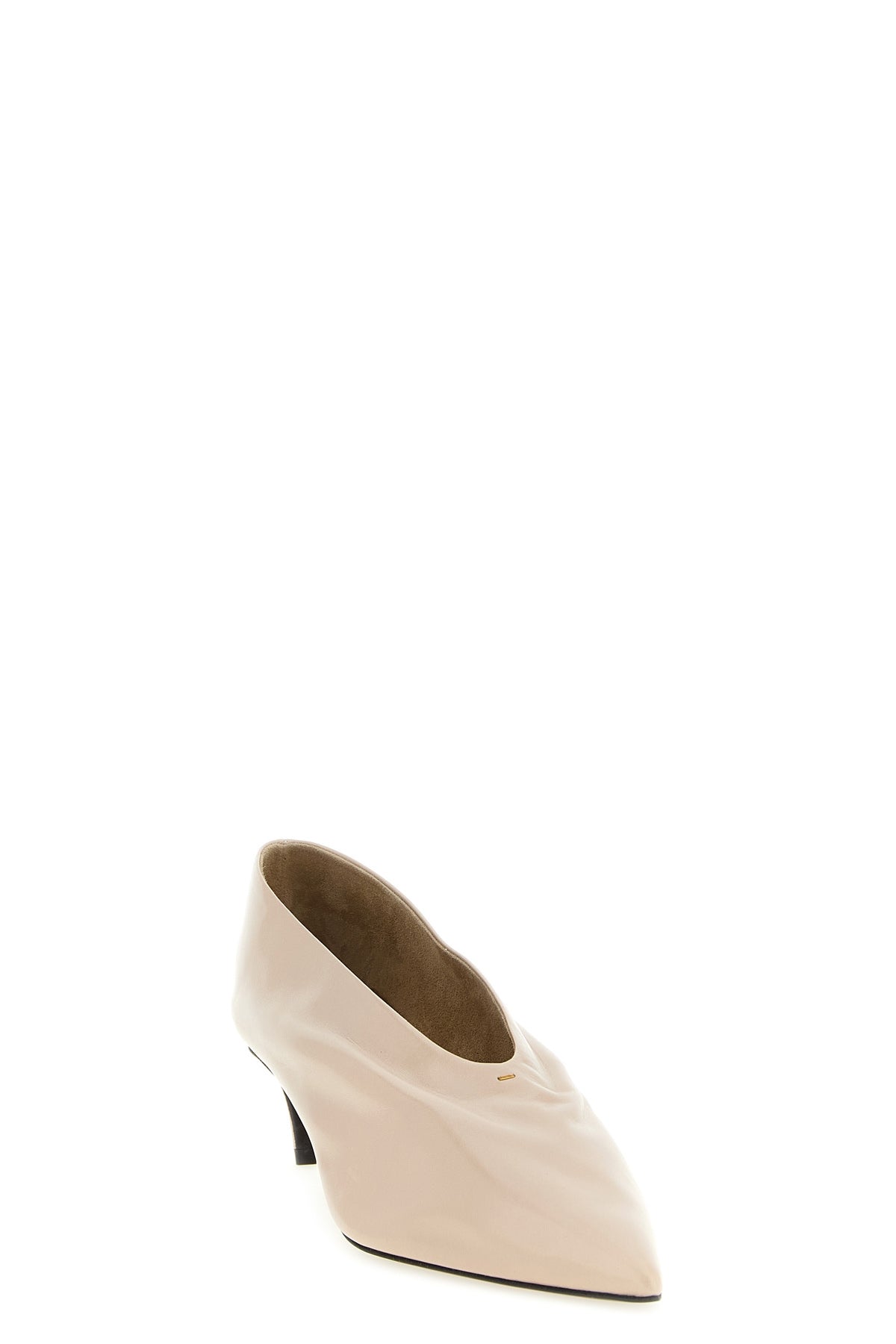 the miriam khaite pumps redefine everyday elegance through a deconstructed and