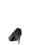 the khaite eve pumps redefine the codes of contemporary elegance through a scu
