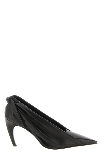the khaite eve pumps redefine the codes of contemporary elegance through a scu