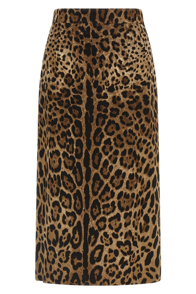the all-over leo animal print longuette skirt by dolce & gabbana defines a rig