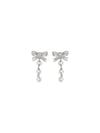 crystal bow and pearl drop earrings