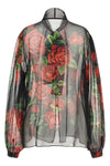 the dolce&gabbana blouse embodies the essence of femininity through impeccable s