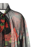 the dolce&gabbana blouse embodies the essence of femininity through impeccable s
