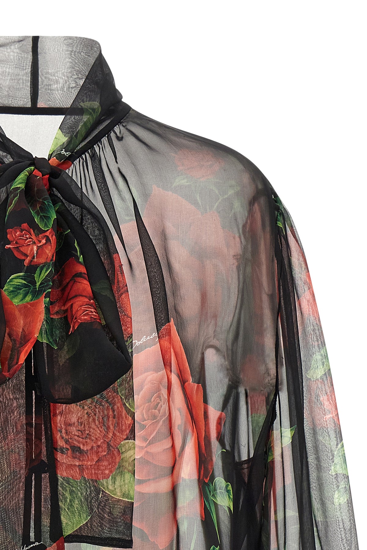the dolce&gabbana blouse embodies the essence of femininity through impeccable s