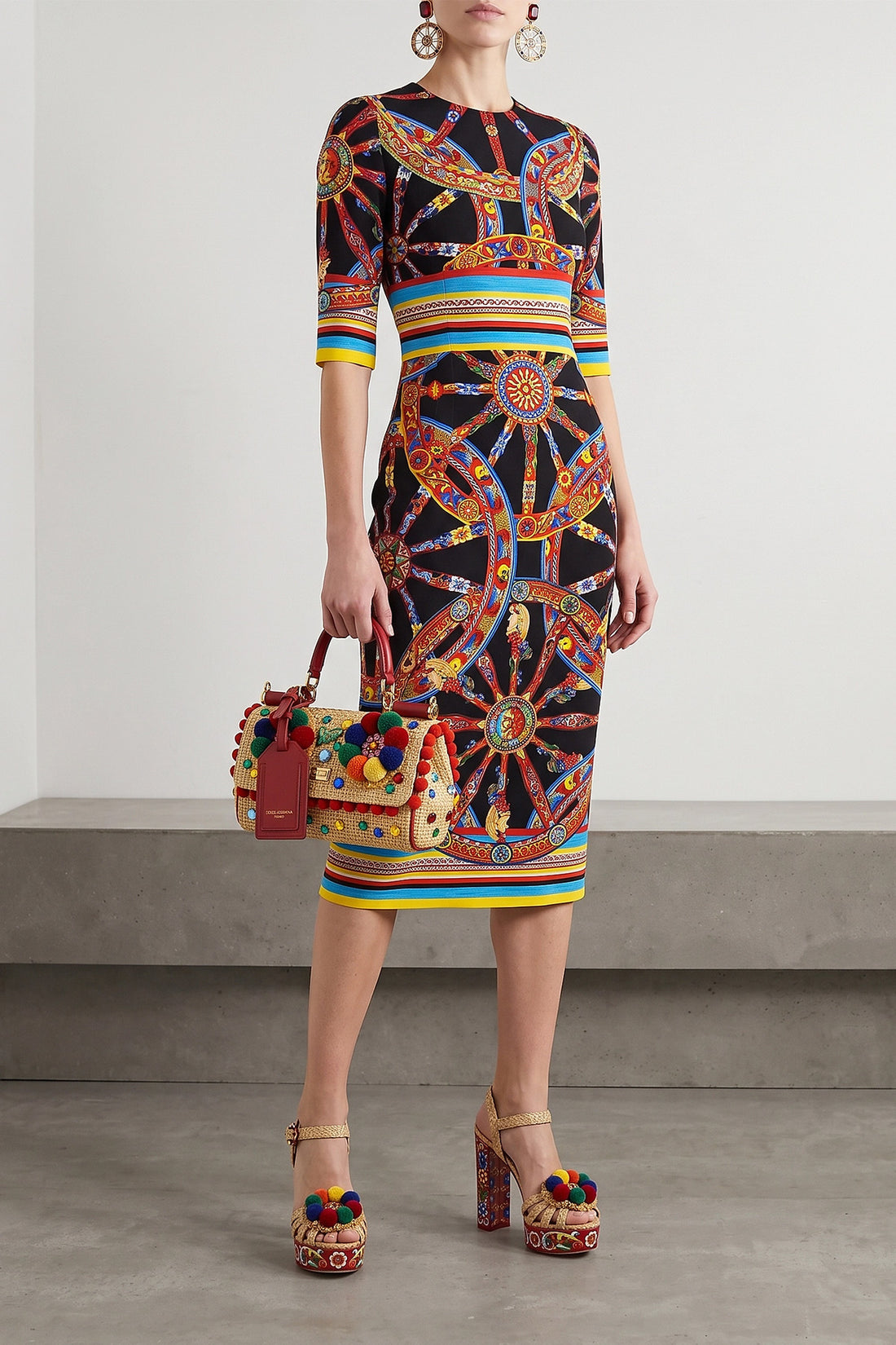 DOLCE &amp; GABBANA 40 the dolce &amp; gabbana midi dress in fine stretch silk stands out for its sheath si