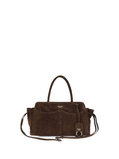 carry large suede handbag