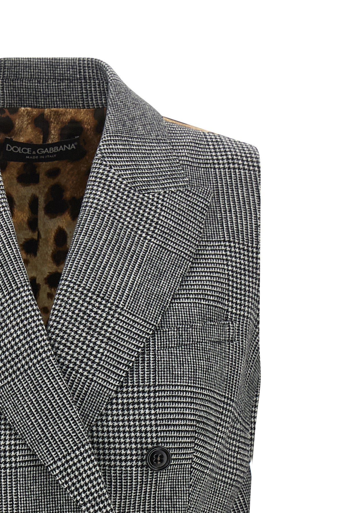 the dolce&gabbana vest defines a new concept of tailoring through a structured a