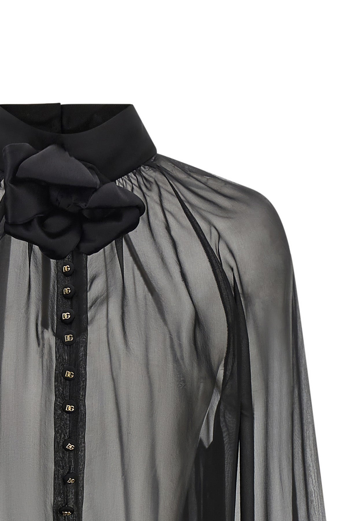 the dolce & gabbana blouse in silk chiffon stands out for its fluid and transpar