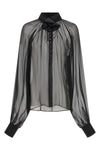 the dolce & gabbana blouse in silk chiffon stands out for its fluid and transpar