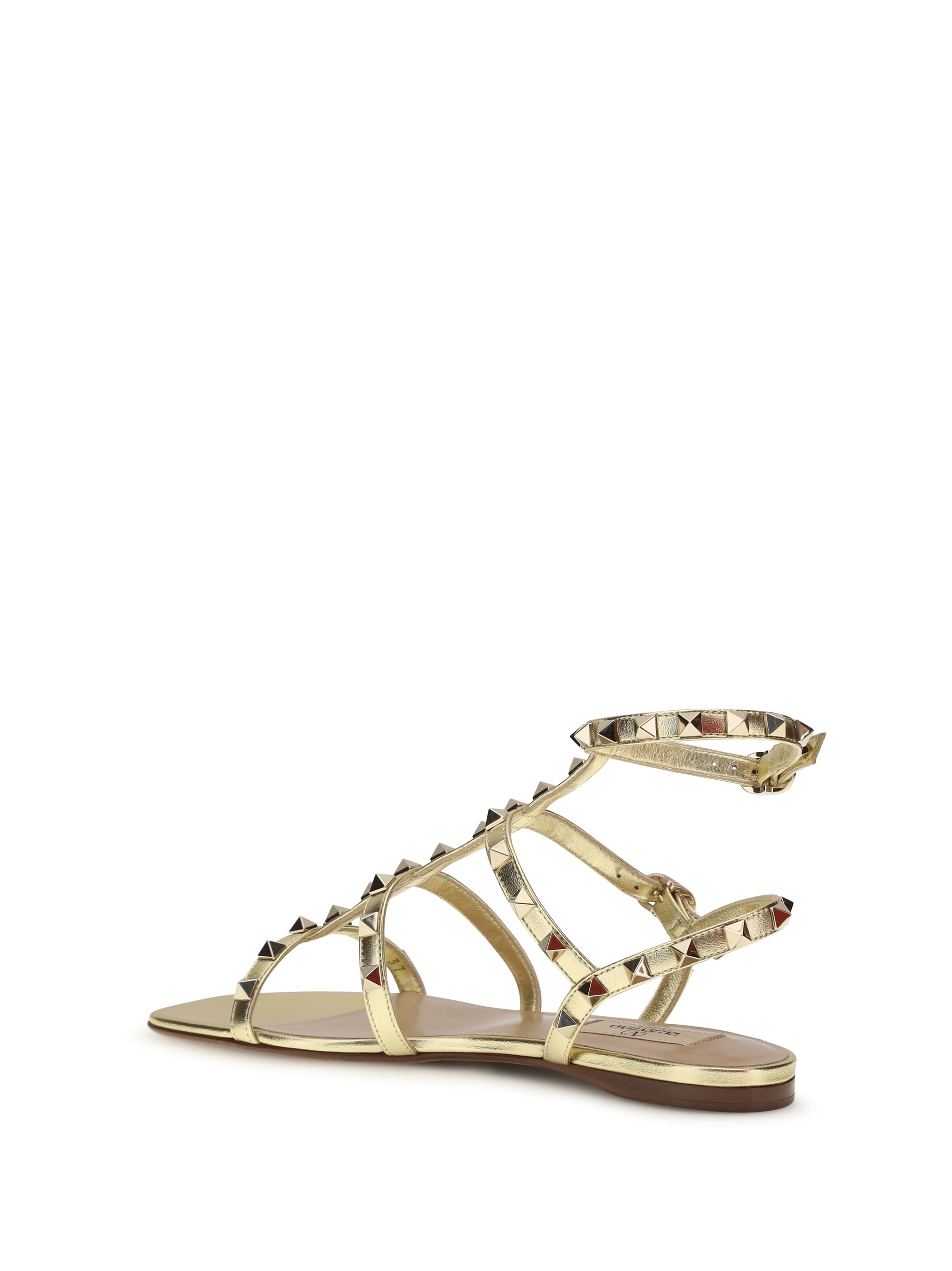 rockstud flat sandals laminated leather