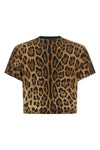 the dolce&gabbana cropped t-shirt defines a bold aesthetic through its tight fit