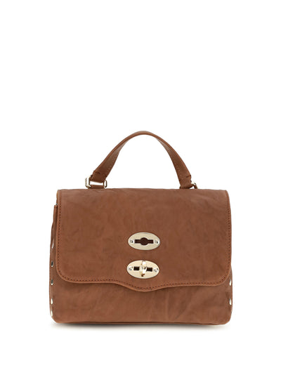 postina officina suede top handle bag