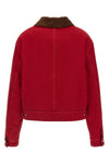 the ami paris jacket defines a cropped silhouette through a rigorous ruby red co