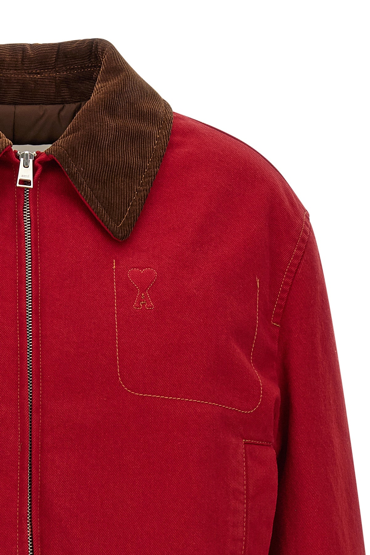 the ami paris jacket defines a cropped silhouette through a rigorous ruby red co
