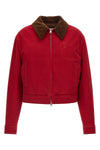 the ami paris jacket defines a cropped silhouette through a rigorous ruby red co