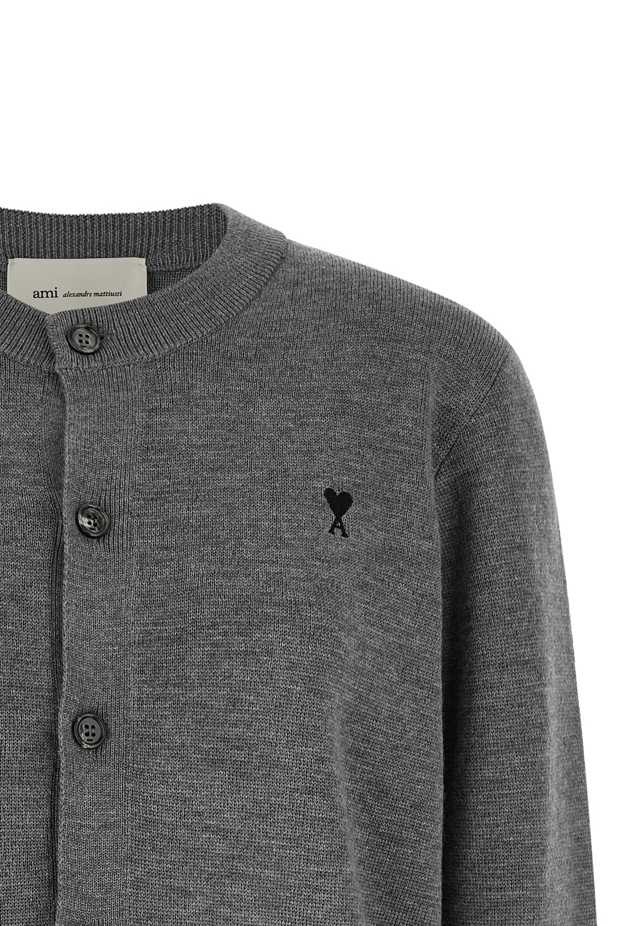 the ami paris crew neck cardigan embodies the essence of everyday luxury through