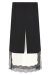 the misenithe skirt redefines the codes of classic tailoring through a play of b