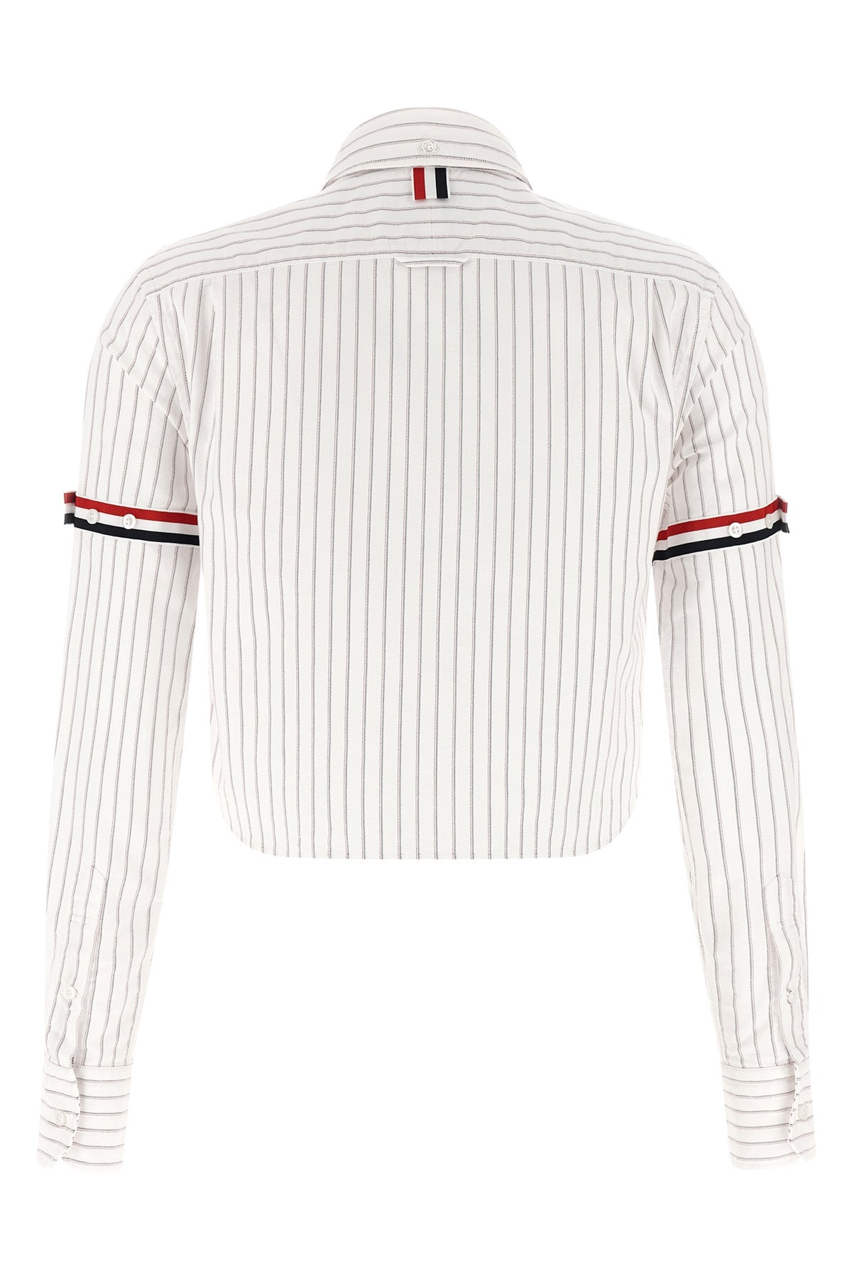 the thom browne cropped shirt reinterprets the codes of classic tailoring throug