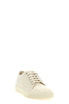 low-top sneakers set a refined standard in contemporary footwear through a preci