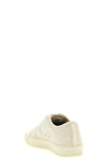 low-top sneakers set a refined standard in contemporary footwear through a preci