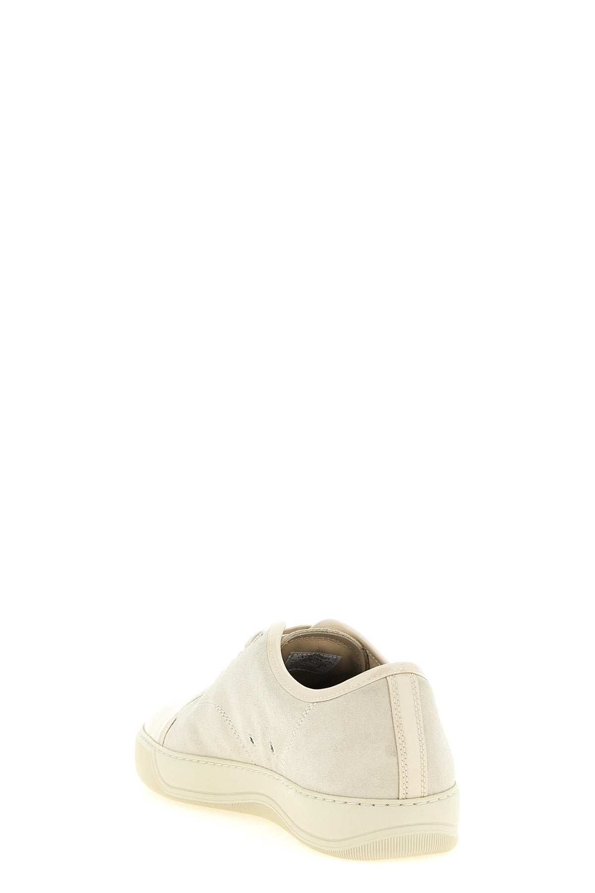 low-top sneakers set a refined standard in contemporary footwear through a preci