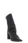 the lemaire glove ankle boots define an enveloping silhouette through a sartor