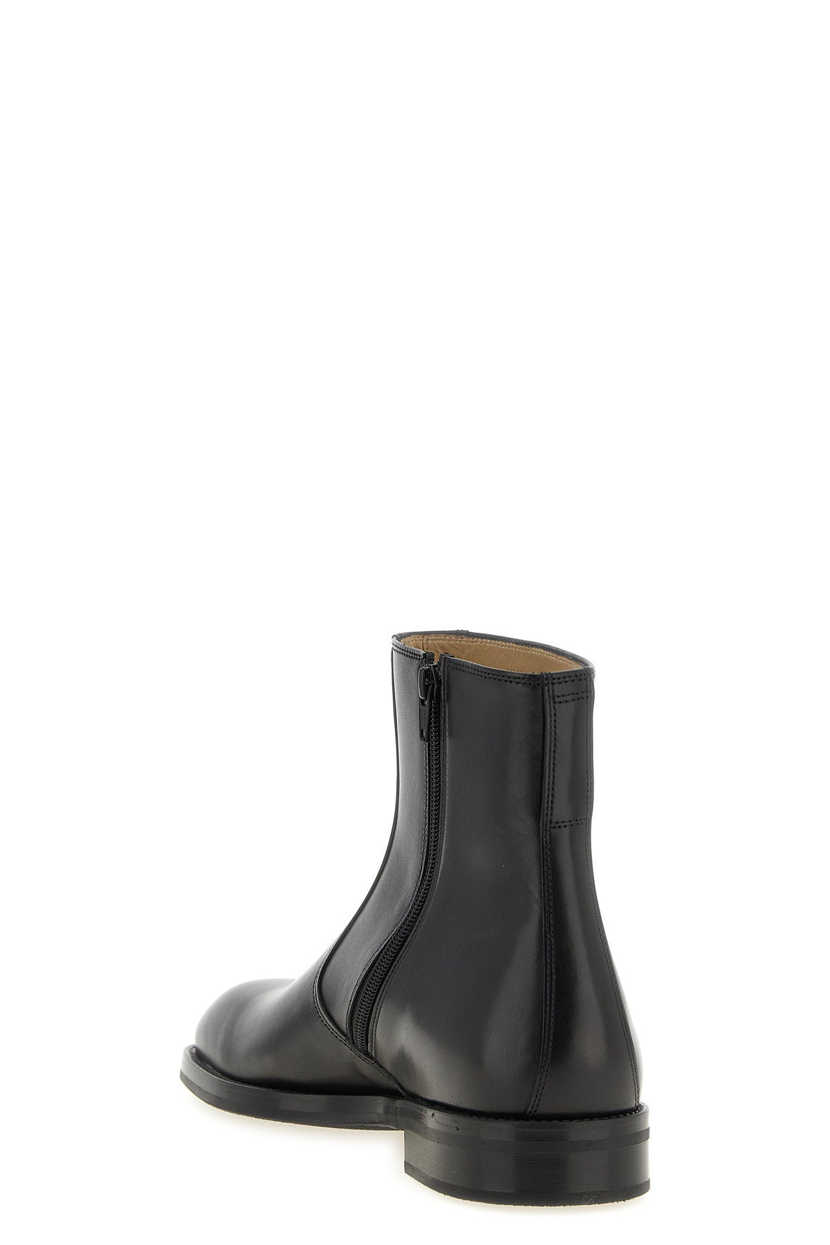 the ankle boots lemaire define a minimalist approach to contemporary footwear