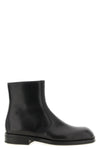 the ankle boots lemaire define a minimalist approach to contemporary footwear