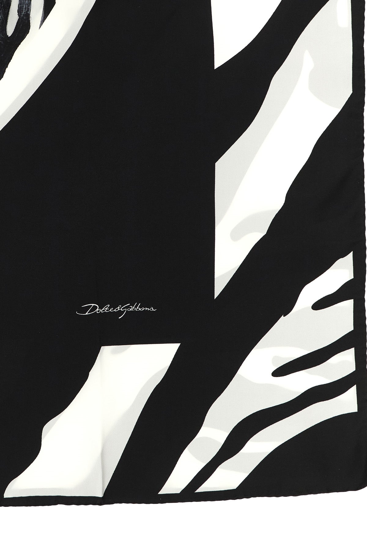 the dolce & gabbana silk stole presents an impactful visual narrative through it