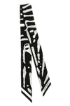 the dolce & gabbana bandeau scarf is distinguished by an elongated silhouette