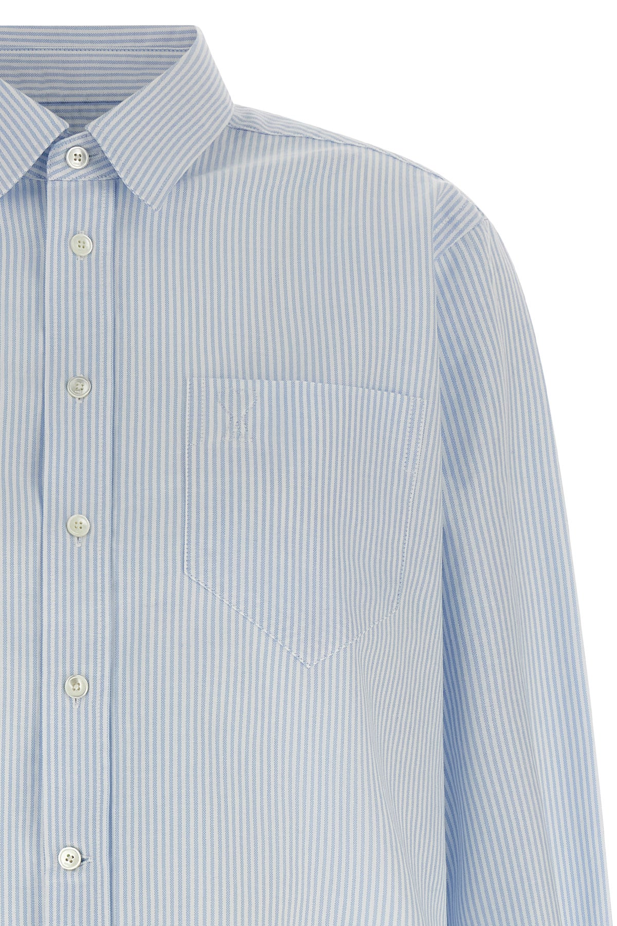 the cropped shirt ami paris redefines the codes of classic tailoring through con