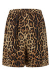 dolce&gabbana silk satin shorts redefine summer clothing through a luxurious sar