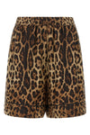 dolce&gabbana silk satin shorts redefine summer clothing through a luxurious sar