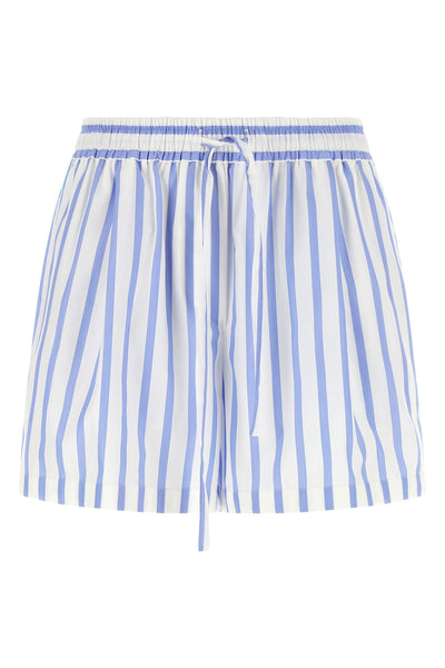 dolce & gabbana poplin bermuda shorts embody casual elegance through fluid sarto