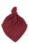 the fendi shawl is distinguished by a square silhouette