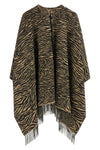 the fendi poncho defines the silhouette through fluid volumes and an open constr