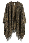 the fendi poncho defines the silhouette through fluid volumes and an open constr