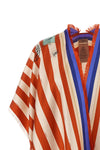 the fendi pure silk poncho stands out for its enveloping and fluid model