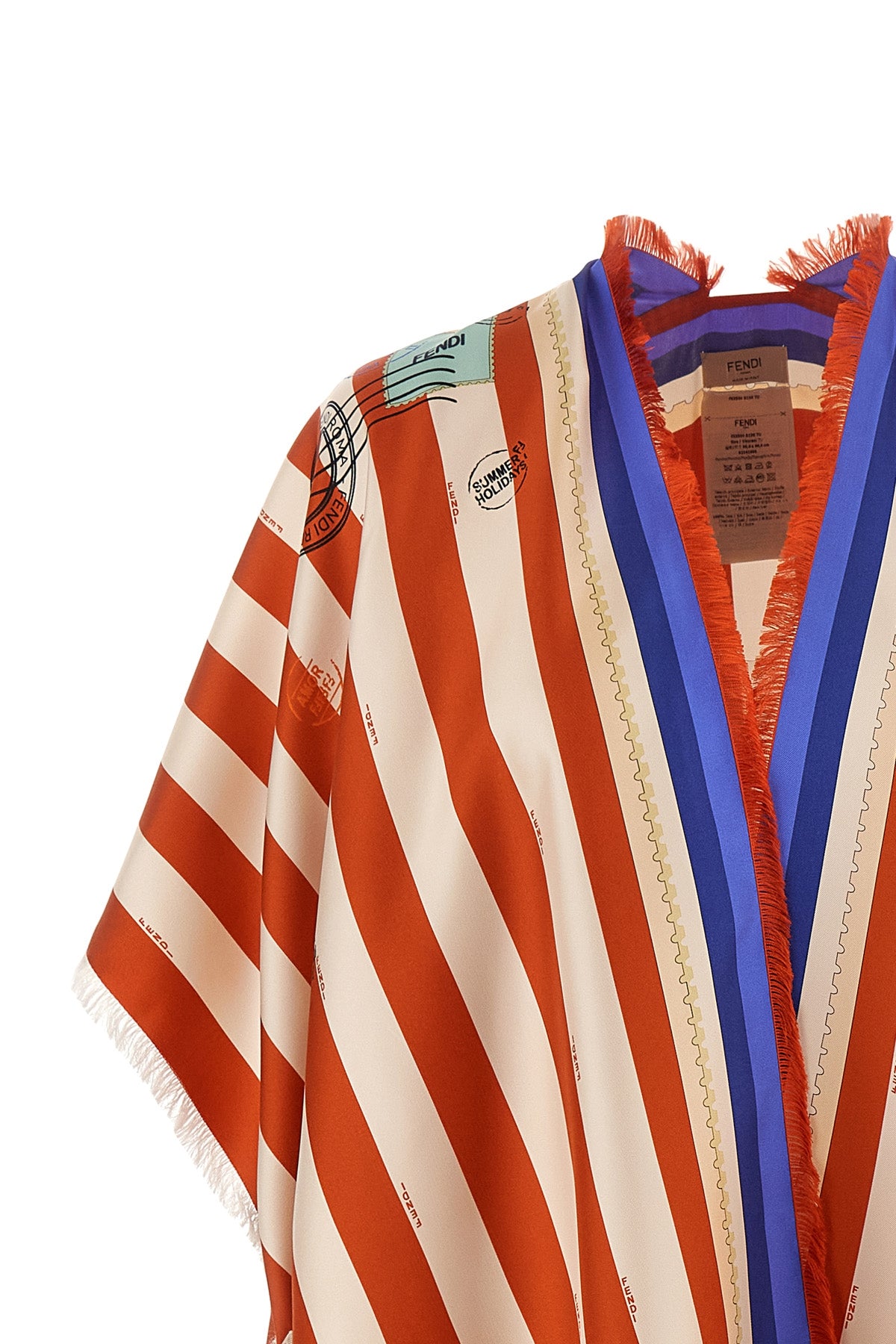 the fendi pure silk poncho stands out for its enveloping and fluid model