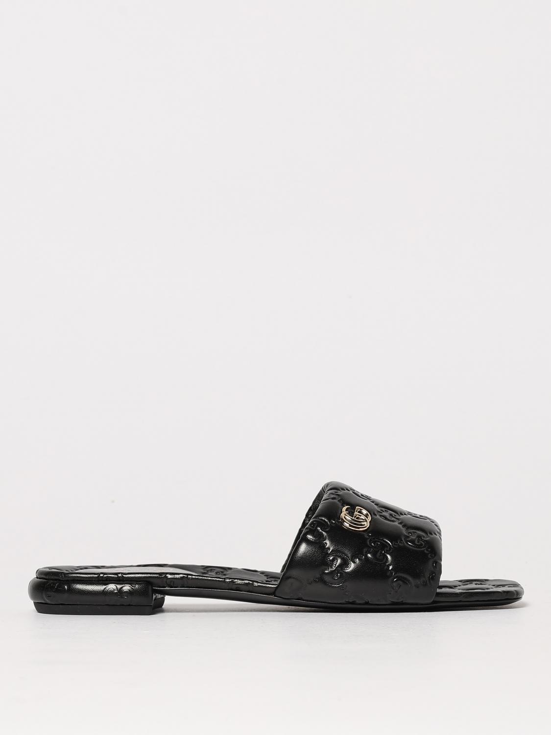 gucci-woman-s-flat-sandals-816330aaea2-black
