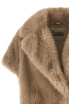 the herno tocco short-sleeved coat redefines the concept of outerwear through
