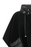 the herno resort poncho redefines the codes of outerwear through a sophisticat