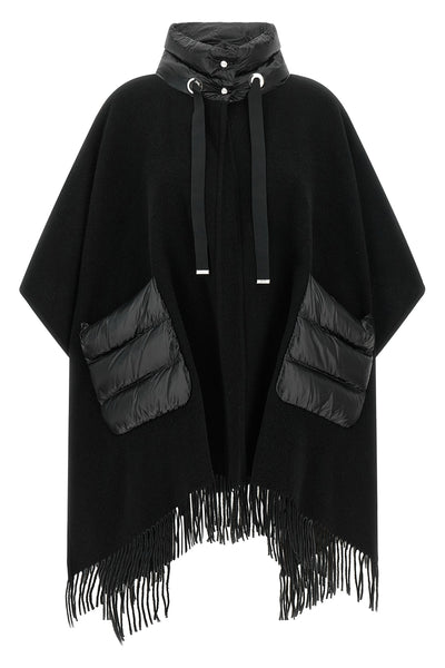 the herno resort poncho redefines the codes of outerwear through a sophisticat